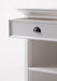Close-up of the Halifax Grand Bedside Table showing the white drawer, black cup handle and open shelf below.