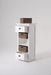 Halifax Grand Storage Unit with Basket Set shown with the top and bottom drawers open, featuring three removable woven baskets.