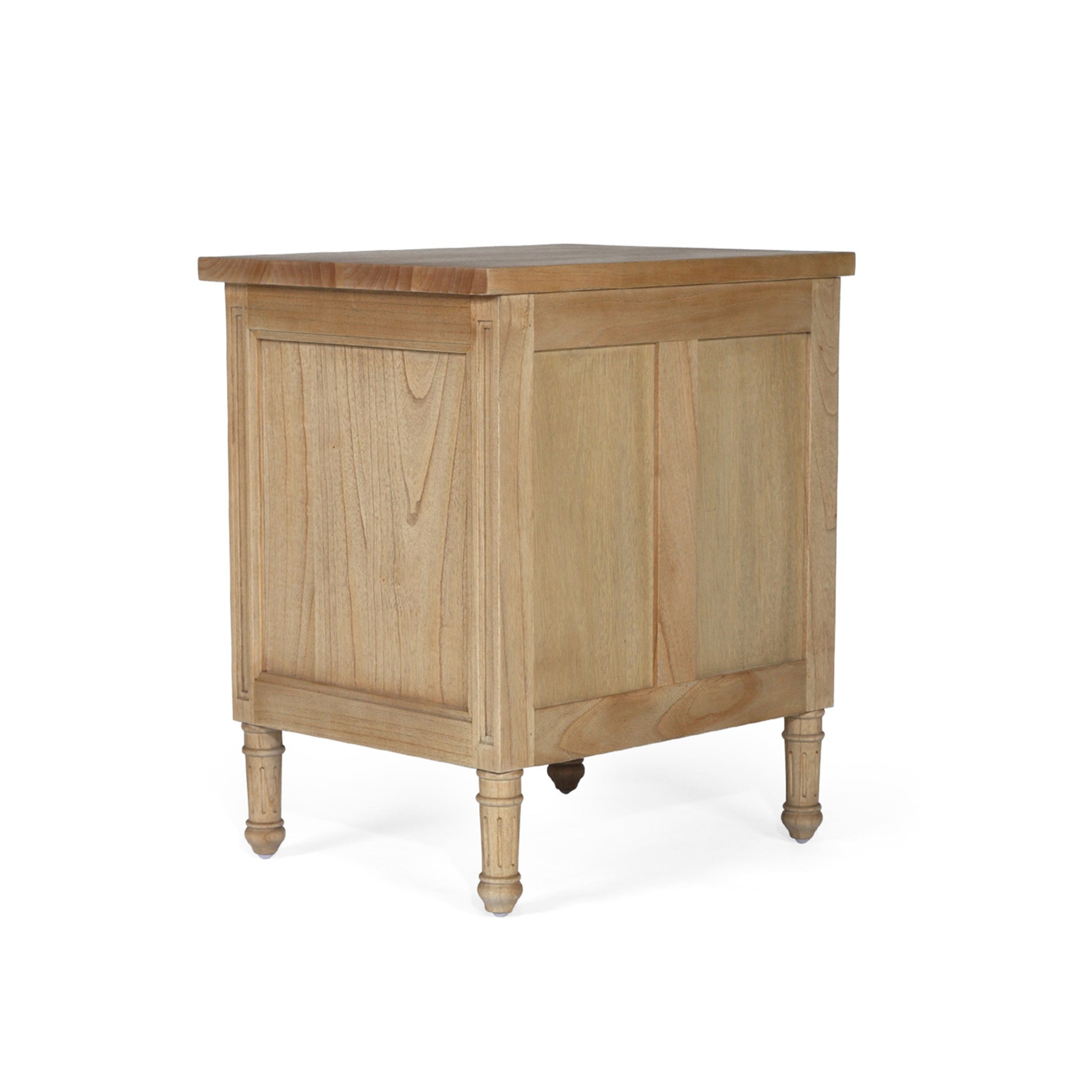 Angled side profile of Hamilton 3 drawer bedside table – Natural showing panel design and carved legs.