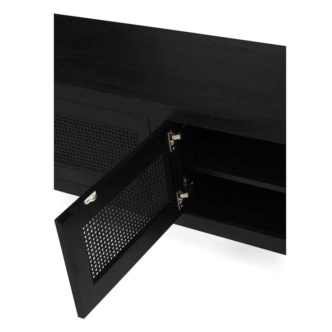 Inside view of Iluka Four Door Entertainment Unit – Black showing shelving and cane door hinge detail