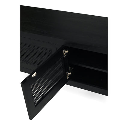 Inside view of Iluka Four Door Entertainment Unit – Black showing shelving and cane door hinge detail