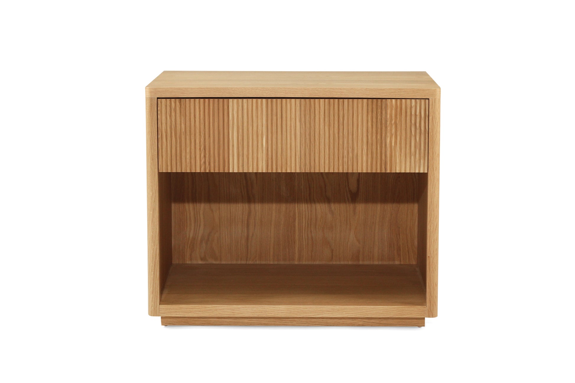 Front view of Harlow Bedside Table – Natural showing ribbed drawer front and open lower shelf