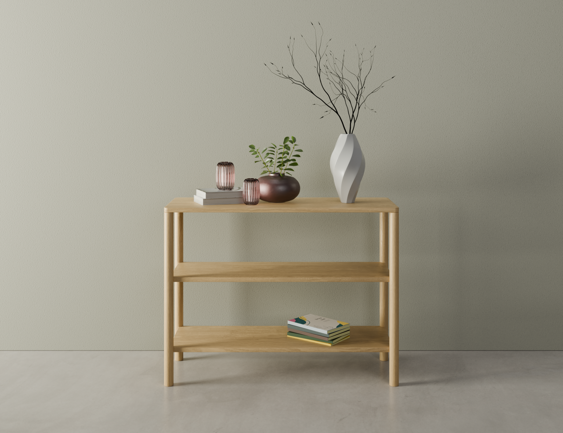 Front view of a 2 tier bookshelf made from American oak displaying books and vases on a polished concrete floor.