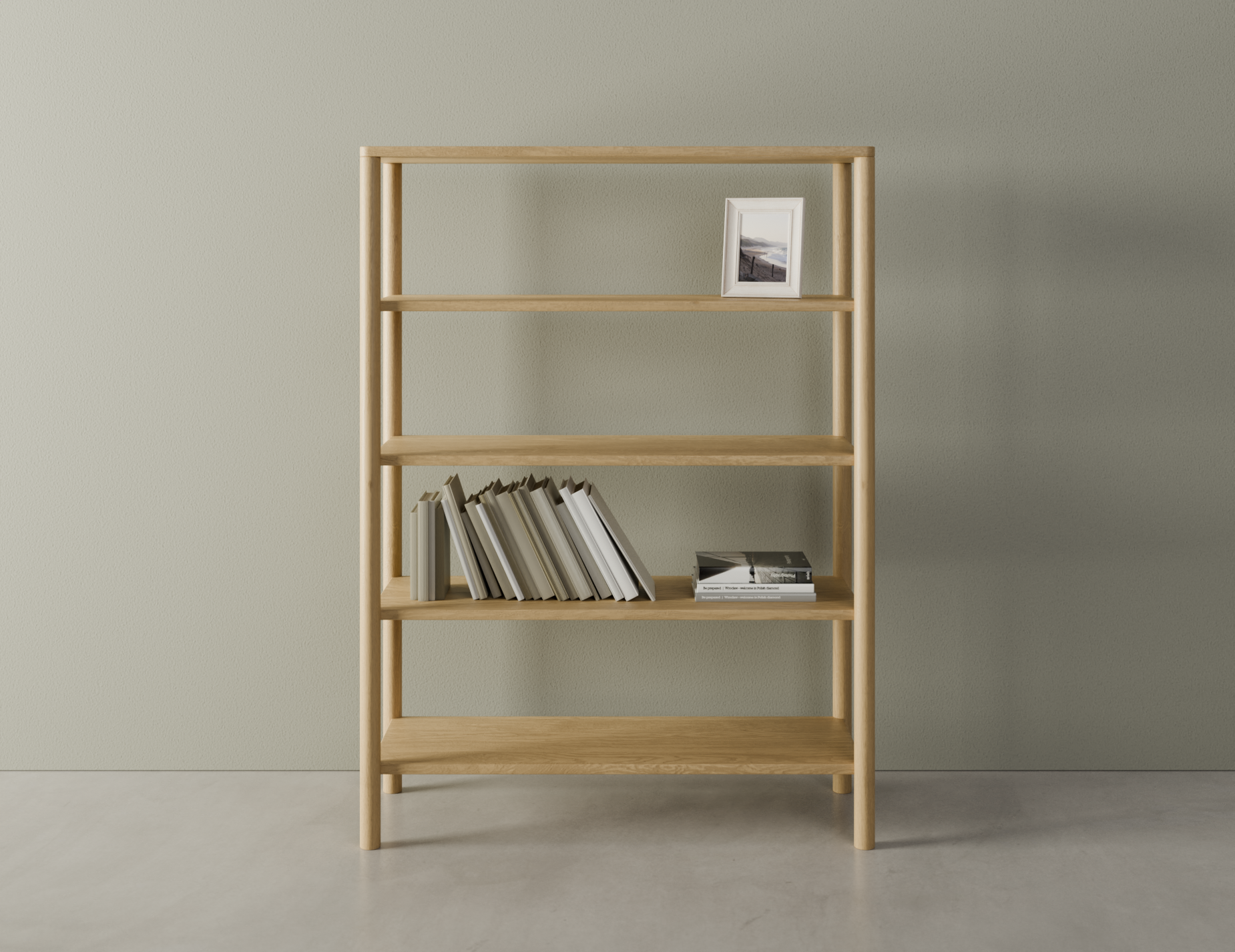 Wooden bookshelf with 4 shelves, 1 with books on it, in a natural American oak finish on a polished concrete floor.