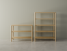 A 2 tier bookshelf next to a 4 tier bookshelf in a natural American oak finish on a polished concrete floor.
