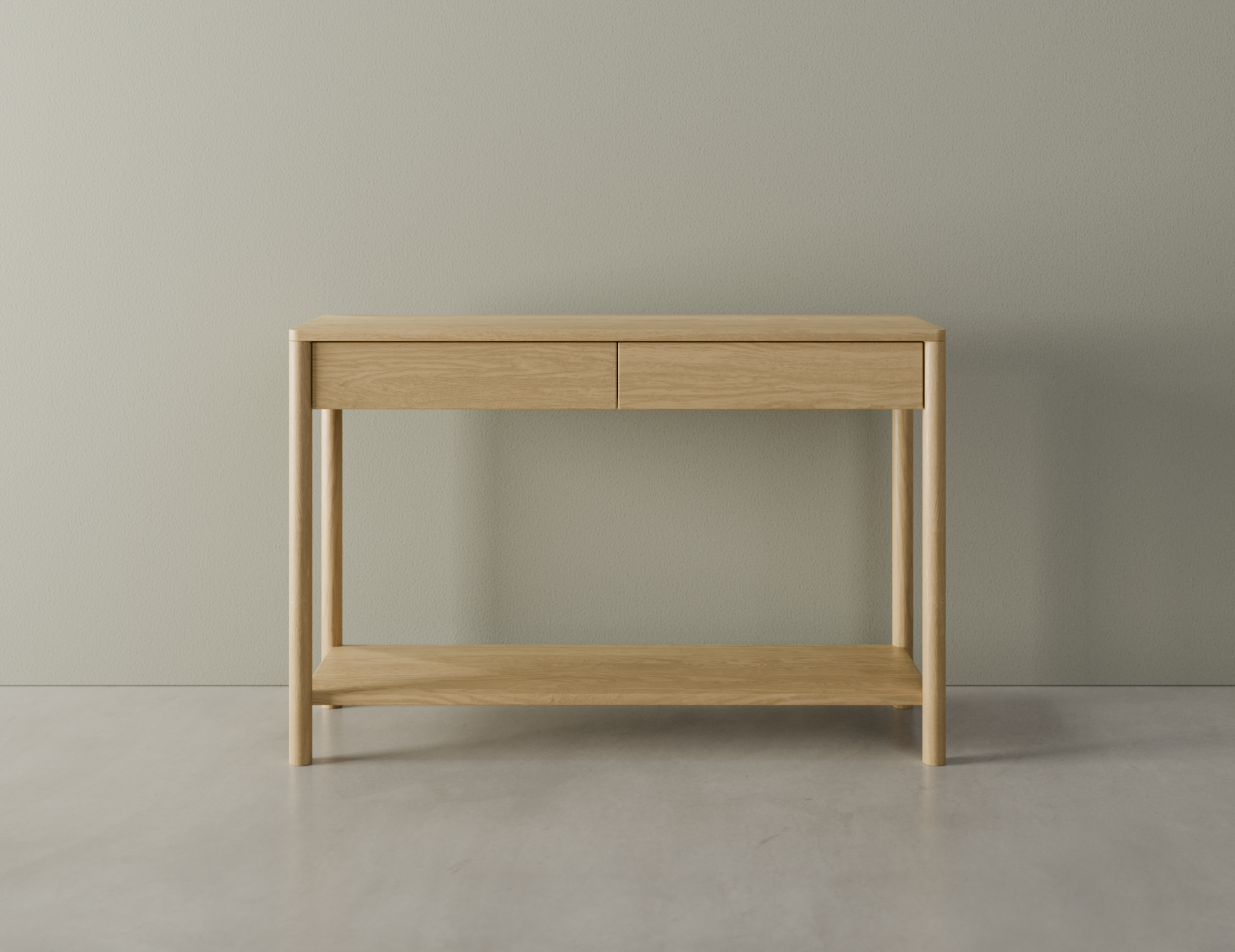 Front view of Nordica wooden console table in natural oak finish with 2 drawers on a polished concrete floor.
