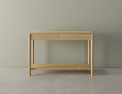 Front view of Nordica wooden console table in natural oak finish with 2 drawers on a polished concrete floor.
