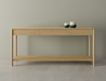Front view of Nordica wooden console table in natural oak finish with 3 drawers on a polished concrete floor displaying 2 ceramic ornaments.