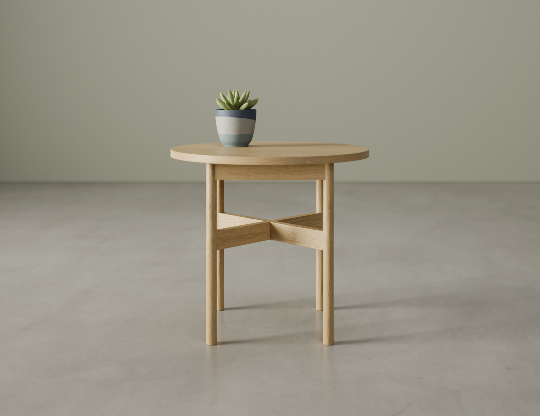Round side table in natural wood finish with a potted plant on top on a polished concrete floor.