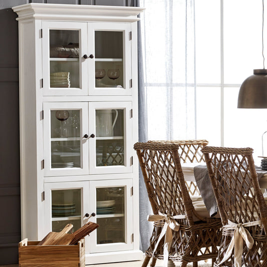 Traditional 3 level white timber pantry cabinet with 6 glass doors in a coastal dining room.
