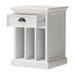 Slightly angled front view of a white timber bedside table with dividers, 1 drawer, which is open, and antique brass hardware.