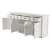 Slightly angled front view of a white wooden buffet with 4 doors and 4 drawers, all of which are open, with antique brass hardware.