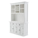 Slightly angled front view of white wooden buffet hutch unit with 2 adjustable shelves, 4 doors and 2 drawers with antique brass hardware.