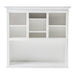 Front view of white wooden buffet hutch upper unit featuring an open central shelf and seven cubbies.