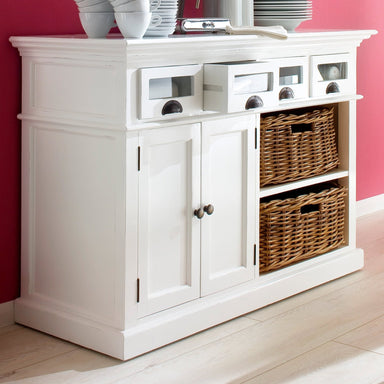 NovaSolo Halifax white wooden kitchen buffet featuring 2 doors, 2 rattan baskets and 4 drawers with antique brass hardware.