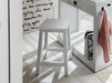 NovaSolo Halifax white wooden stool with 4 legs.