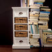 NovaSolo Halifax white wooden storage unit with 3 rattan baskets and 2 drawers with antique brass hardware.