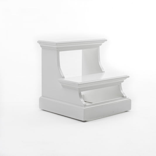 Slightly angled front view of a white timber bed step.