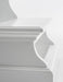 Close-up view of the bottom steps of a white timber bed step.