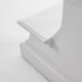 Close-up view of the bottom corner of a white timber bed step.