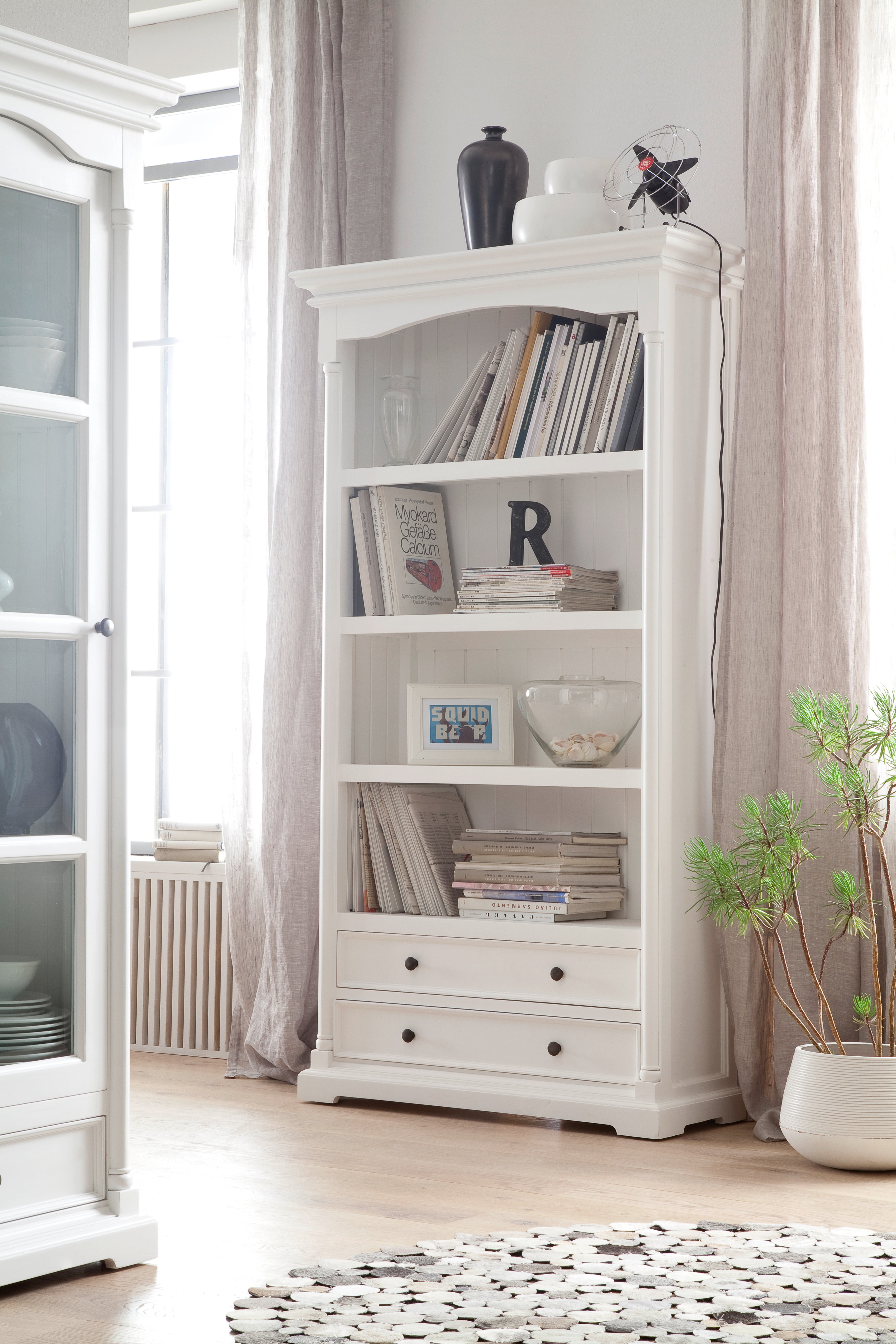NovaSolo Provence white wooden bookcase with 4 shelves and 2 large drawers with antique brass hardware.