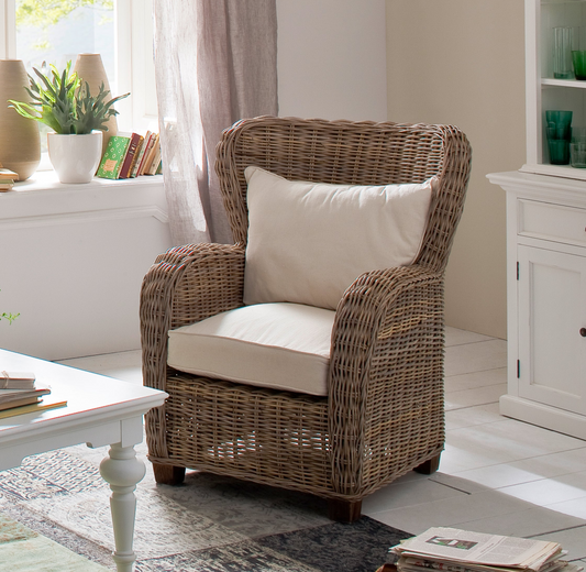 NovaSolo Wickerworks Queen chair with cushions made from kubu rattan and mahogany.