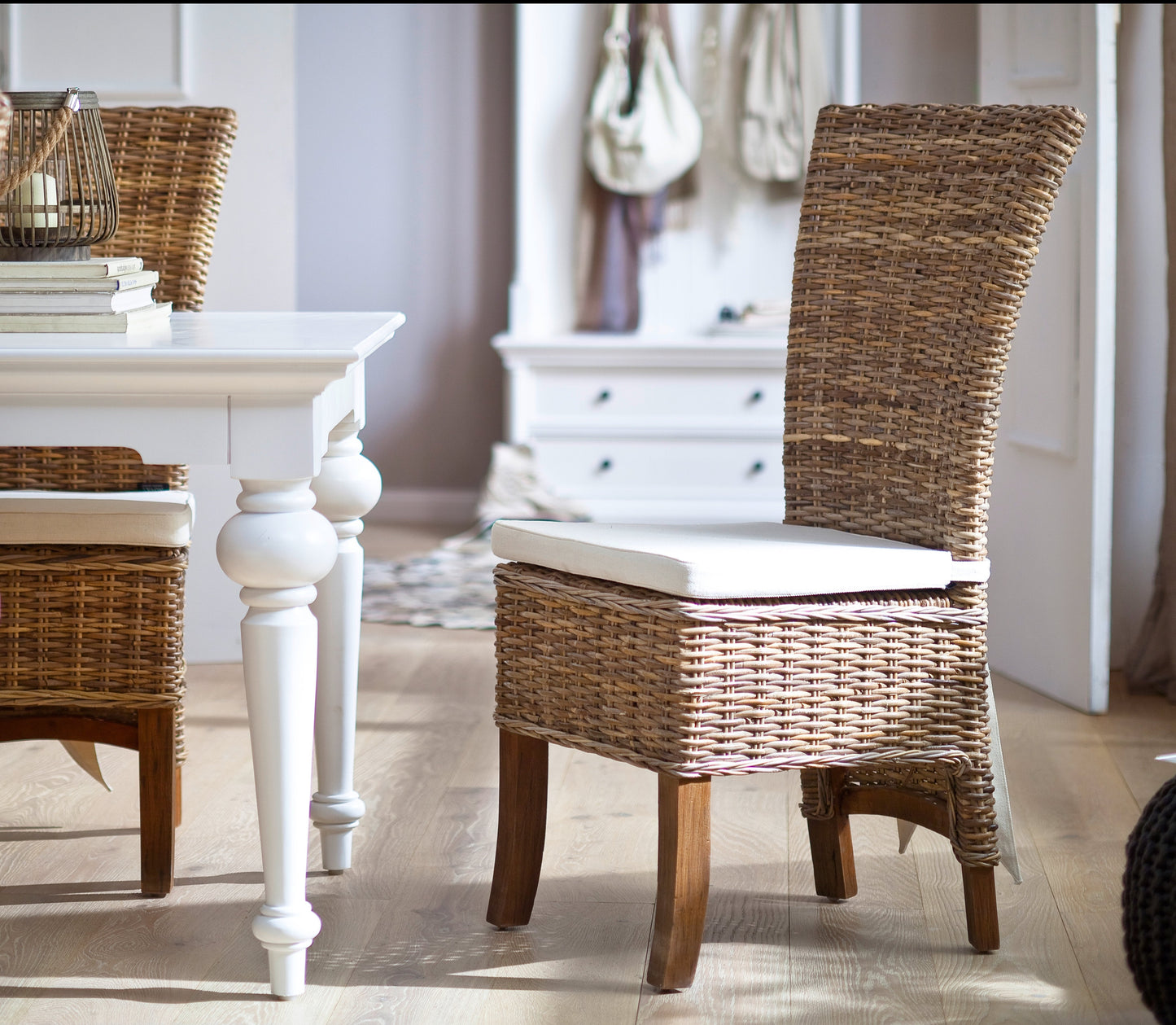 NovaSolo Wickerworks Salsa dining chair (set of 2) with cushion made from split rattan and mahogany.