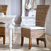 NovaSolo Wickerworks Salsa dining chair (set of 2) with cushion made from split rattan and mahogany.