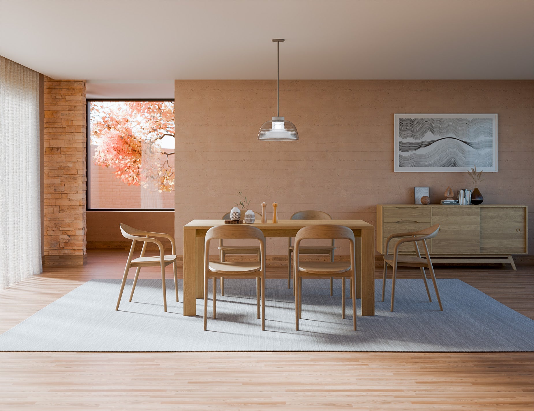 Wide room view of Pier Dining Table - Solid Oak - 160 cm x 90 cm positioned on a large rug beneath a pendant light in a contemporary dining interior.