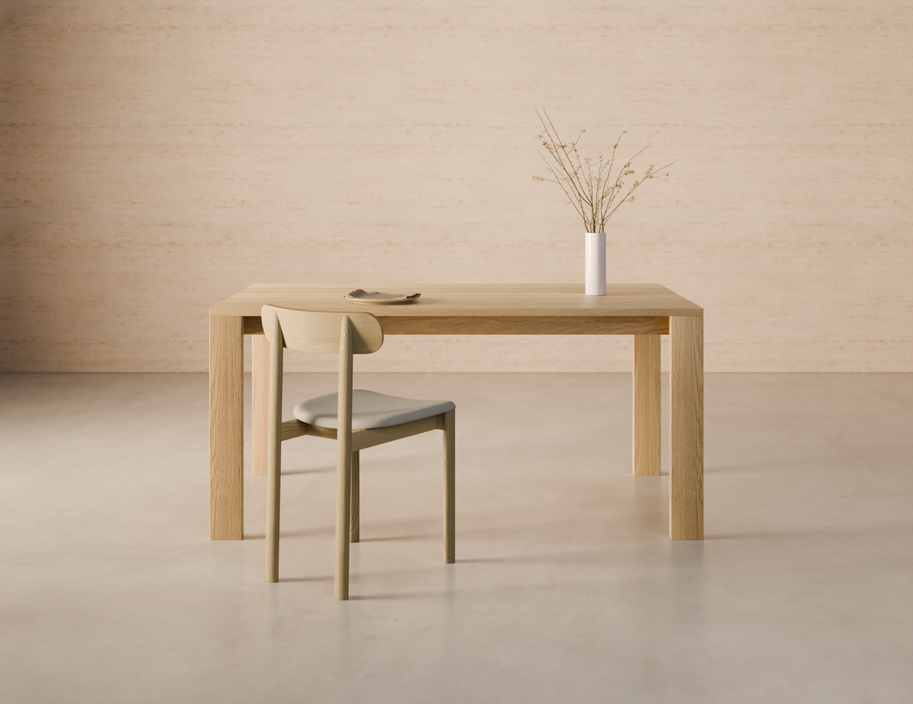 Front lifestyle view of Pier Dining Table - Solid Oak - 160 cm x 90 cm styled in a minimalist dining space with oak chairs and neutral wall backdrop.