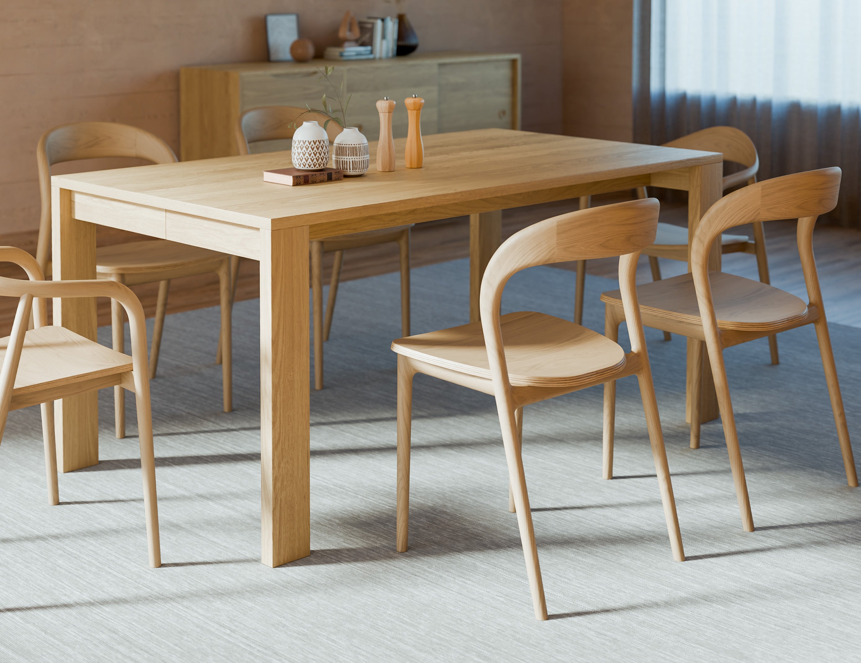 Close three-quarter view of Pier Dining Table - Solid Oak - 160 cm x 90 cm showcasing thick oak tabletop and sturdy square legs.
