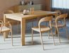 Close three-quarter view of Pier Dining Table - Solid Oak - 160 cm x 90 cm showcasing thick oak tabletop and sturdy square legs.