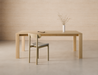 Front view of Pier Dining Table - Solid Oak - 200 cm x 95 cm styled in a minimalist dining space with natural timber chair and neutral interior.