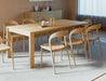 Close lifestyle detail of Pier Dining Table - Solid Oak - 200 cm x 95 cm highlighting natural oak grain and modern decor styling.