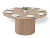 6 to 8 seater round dining table in natural American ash finish displaying plates and cutlery.