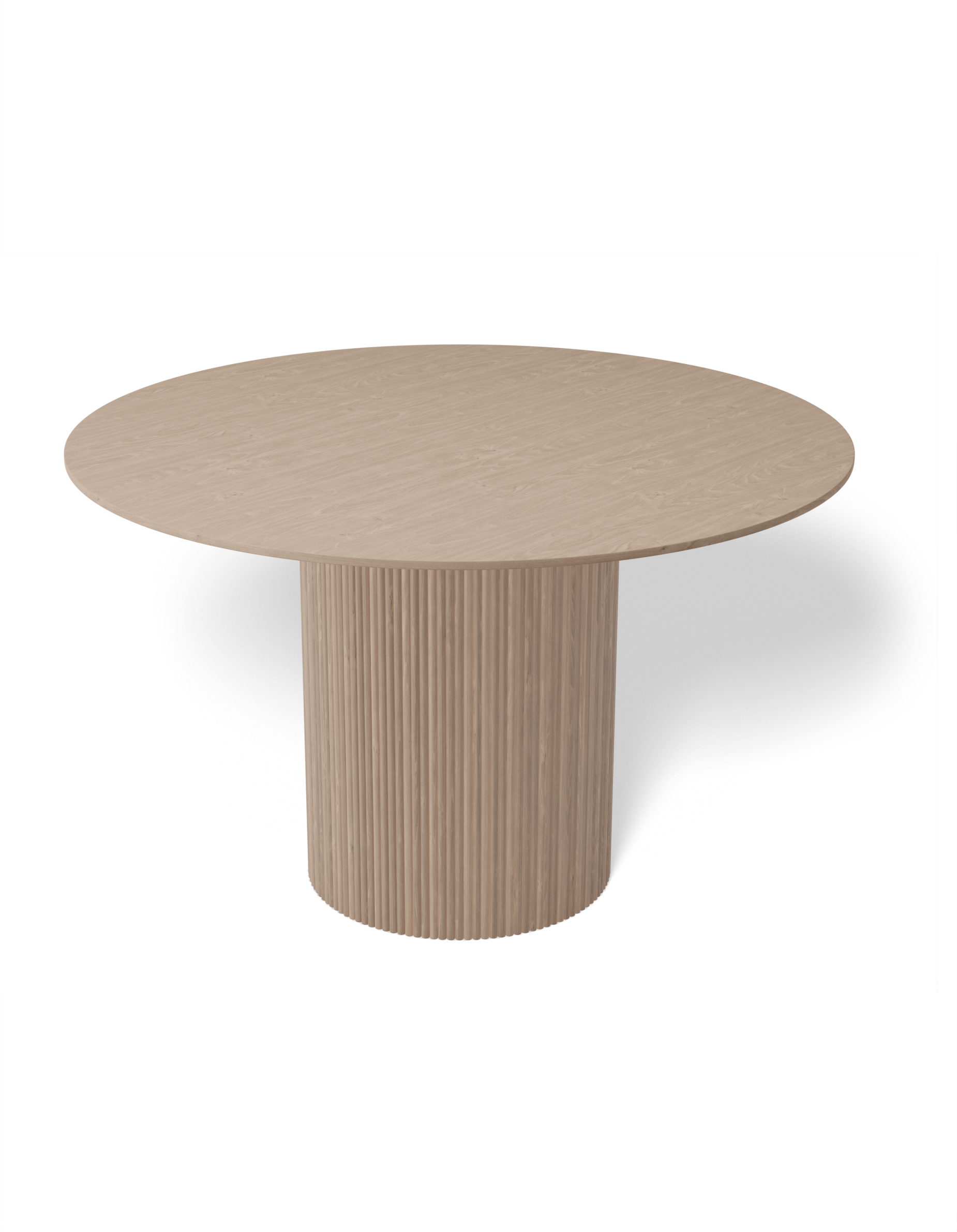 4 to 5 seater round dining table in natural American ash finish.