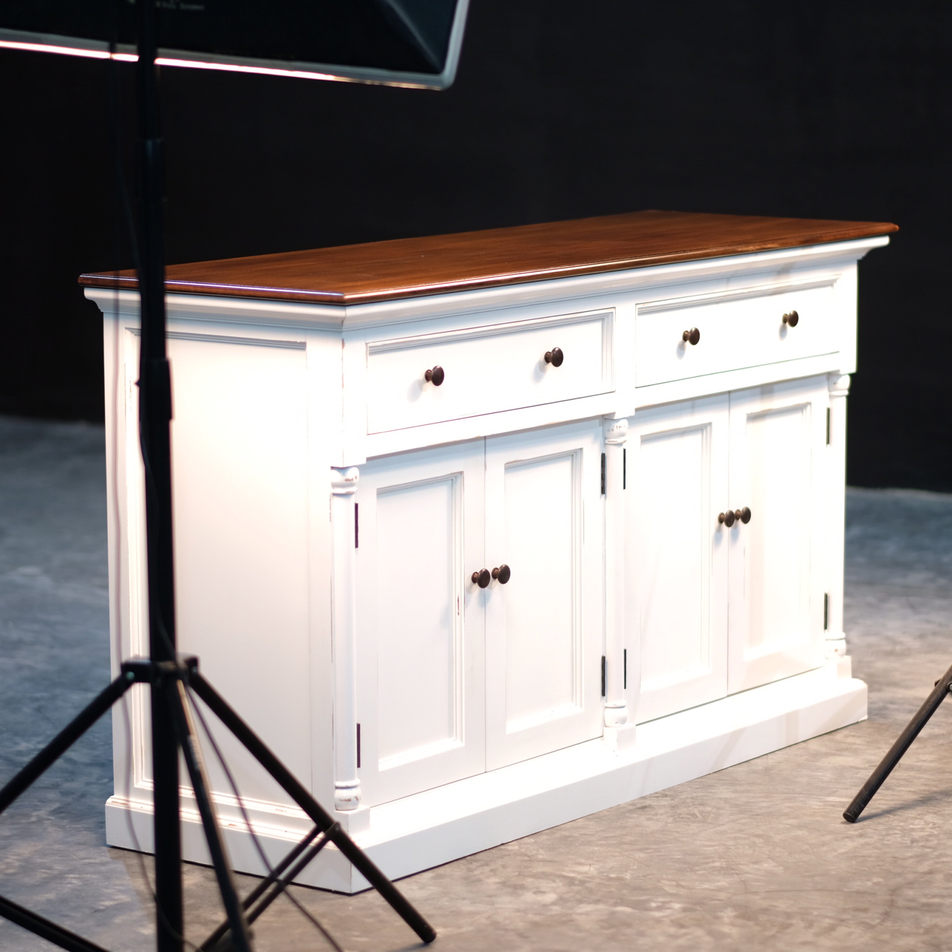 Provence Accent Classic Buffet photographed in a studio setting with dark timber top, white painted base and black hardware.