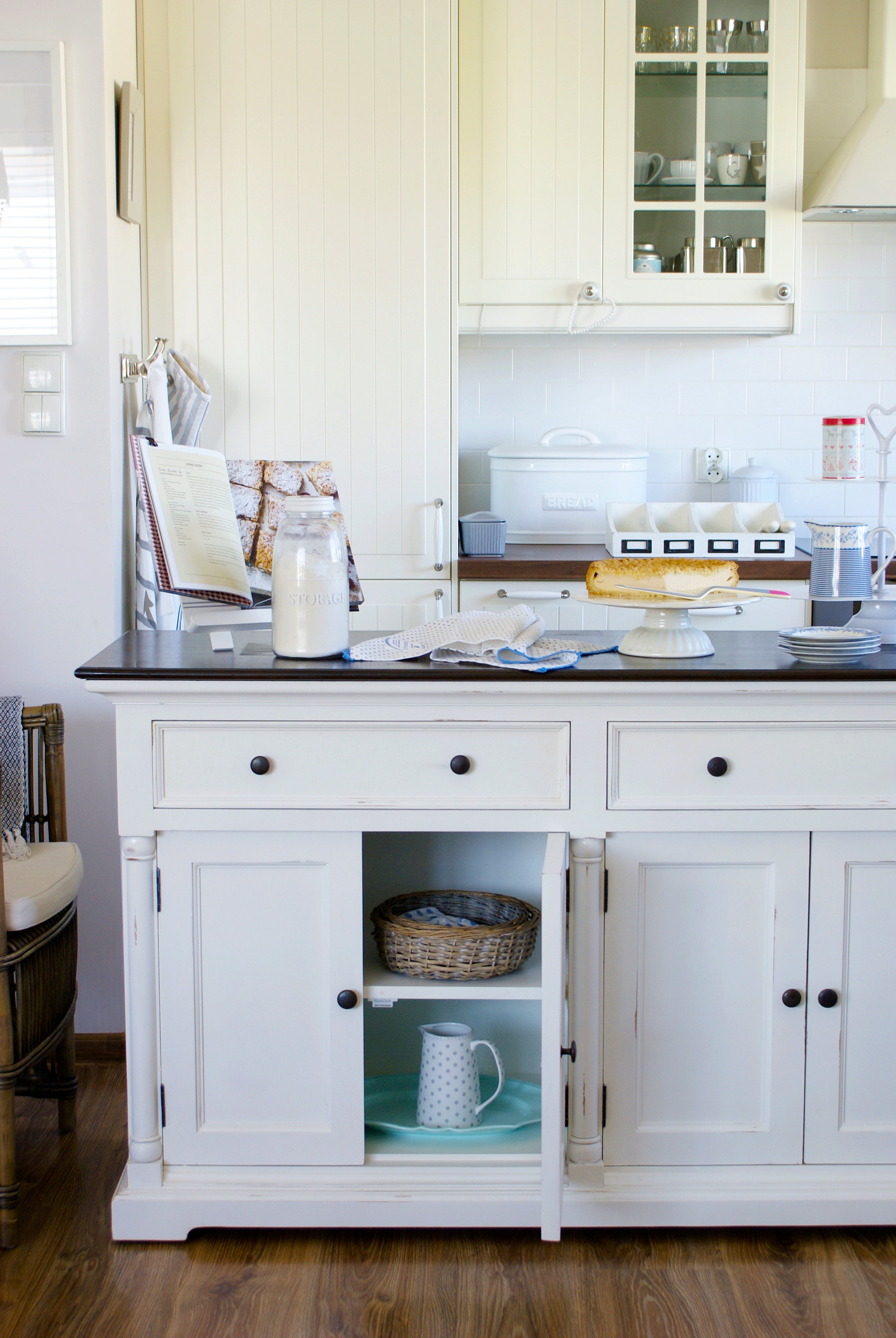 Provence Accent Classic Buffet used as a kitchen island with one cupboard door open to show internal storage.