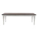 Front view of the Provence Accent Dining Table with a dark timber top, white painted base and traditional turned legs.