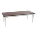 Full view of the Provence Accent Dining Table with a dark timber top, white painted base and classic turned legs.