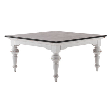 Angled product view of the Provence Accent Square Coffee Table featuring a dark timber top, white base and turned legs.