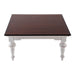 Front view of the Provence Accent Square Coffee Table with a square dark timber top and white distressed turned legs.