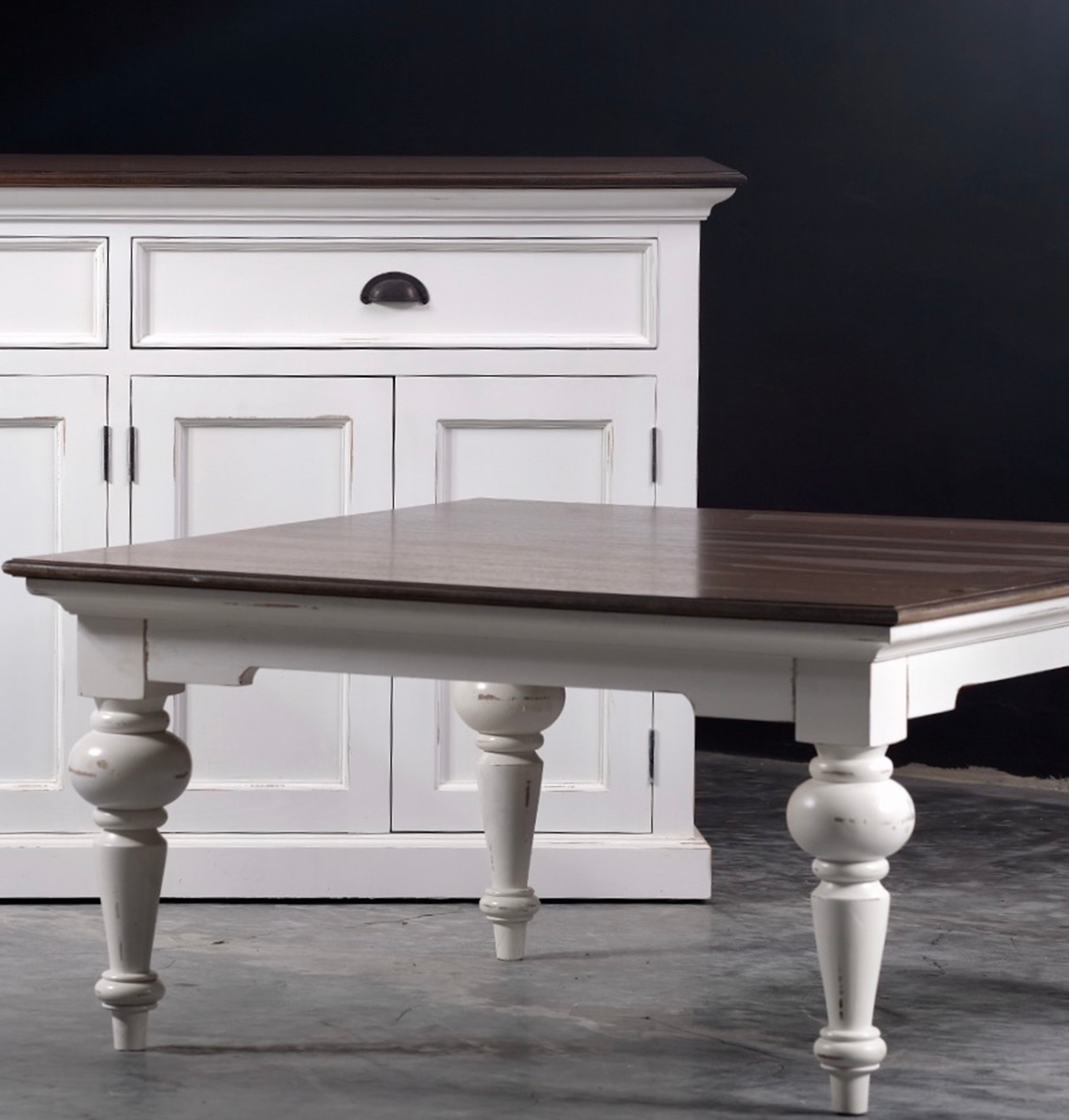 Provence Accent Square Coffee Table styled in a room with matching white storage cabinet, dark timber top and turned legs.