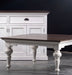 Provence Accent Square Coffee Table styled in a room with matching white storage cabinet, dark timber top and turned legs.