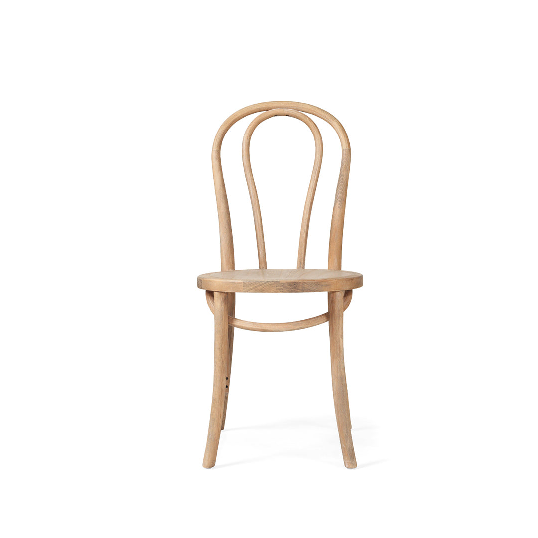 Front view of the Replica Bentwood Chair in weathered oak with classic European café chair shape.