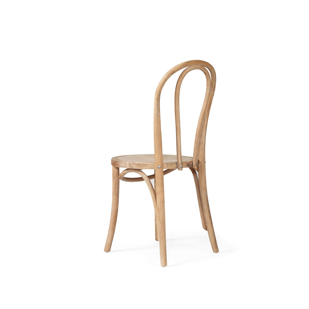 Side angled view of the Replica Bentwood Chair in weathered oak showing curved back and timber seat.