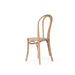 Side angled view of the Replica Bentwood Chair in weathered oak showing curved back and timber seat.