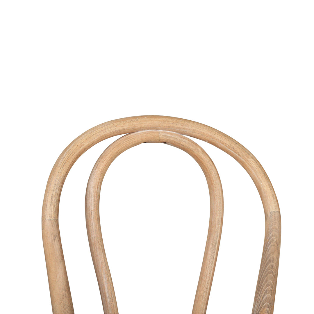 Close up of the Replica Bentwood Chair weathered oak curved backrest showing natural timber grain.