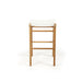Straight front-facing view of Zen Backless Bar Stool – White – Close Weave highlighting contoured seat and linear footrests.