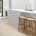 Kitchen corner featuring Zen Backless Bar Stools – Sand – Open Weave beneath a crisp white bench top and matte fittings.